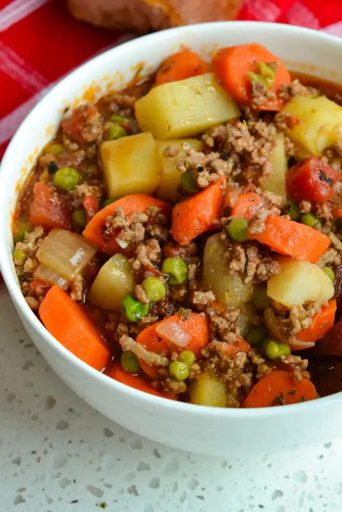 Old fashioned hamburger stew is made in about forty minutes with ground beef, fresh vegetables and a easy blend of spices