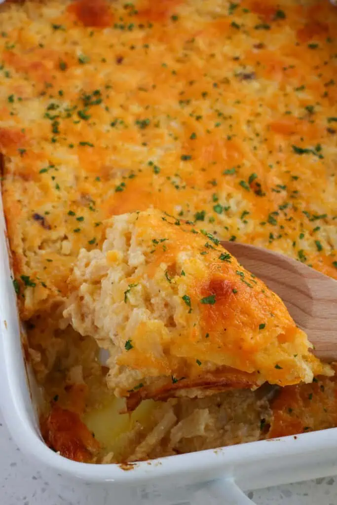 A super cheesy shredded hash brown casserole recipe made with ten common ingredients and in the oven in less than 15 minutes. 