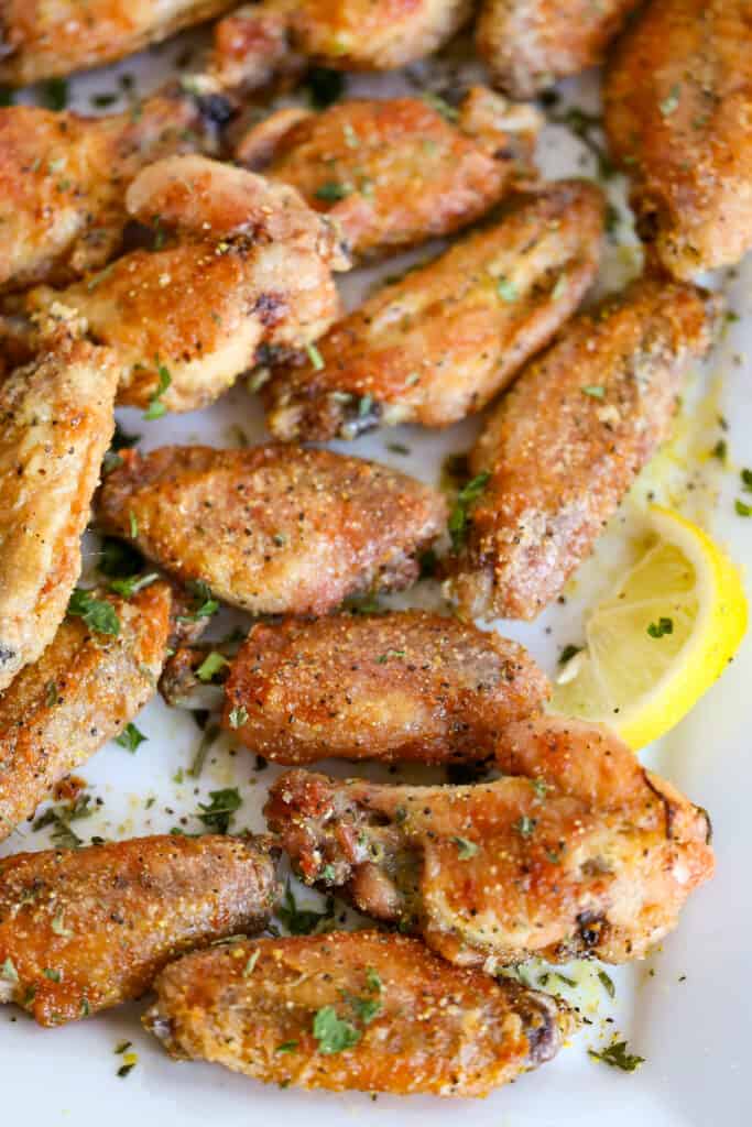 Tasty and crispy Lemon Pepper Chicken Wings are made with just seven simple ingredients in the oven or the air fryer. 