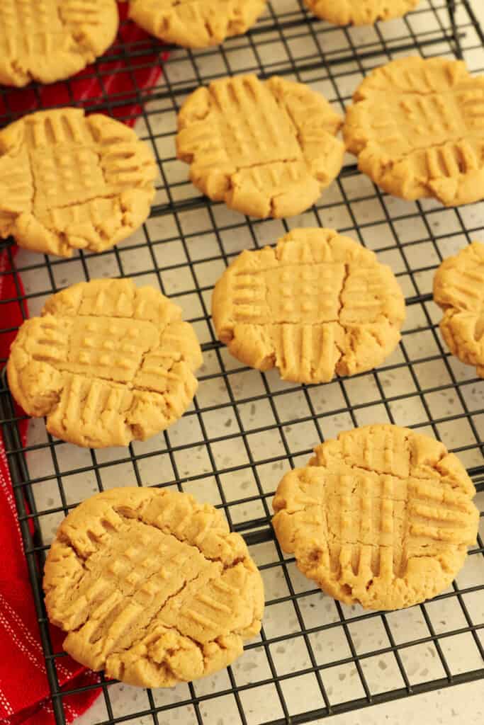 These amazingly delicious soft Peanut Butter Cookies are so easy to make.  They come together real quick and bake up in about 10 minutes.  