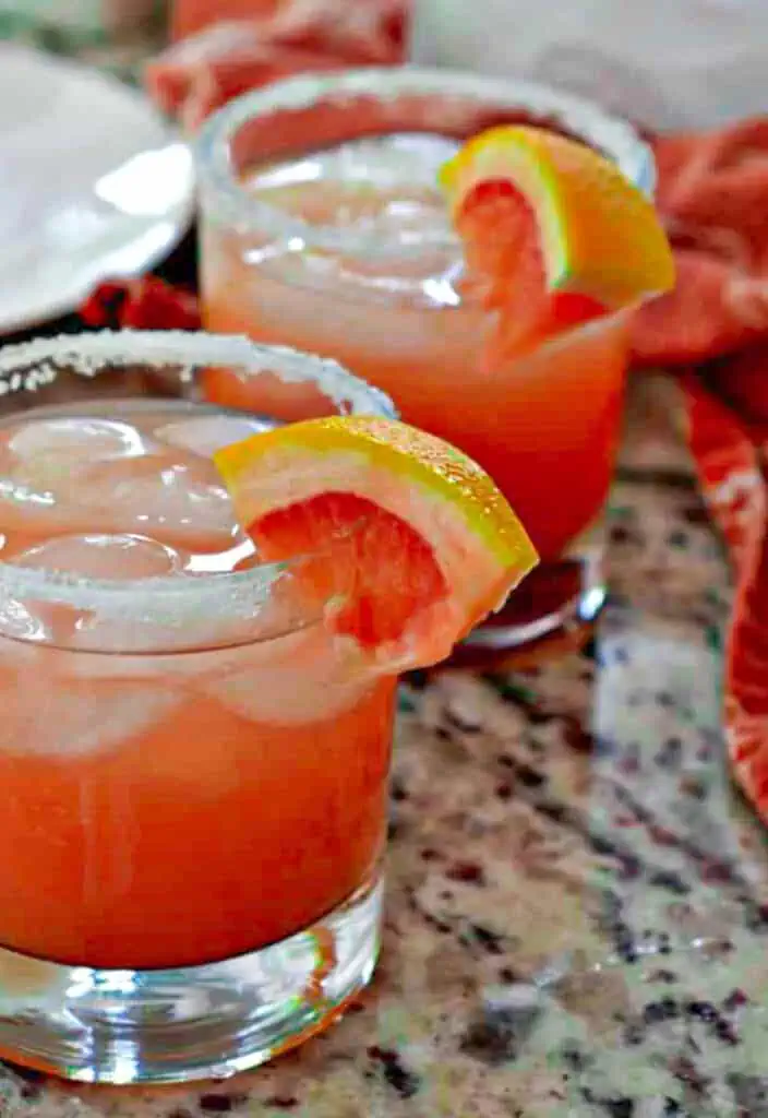 This flavorful Salty Dog Cocktail is an easy blend of grapefruit juice, vodka, and salt.  The end result is a memorable cocktail with a sweet and salty flavor that is perfect for brunch, holiday parties, neighborhood soirees, and bridal showers.