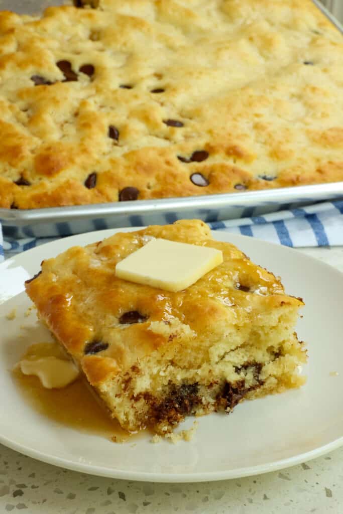 These Sheet Pan Pancakes make pancakes for a large family or crowd incredibly easy with the same great taste and fluffy texture.   Top with fresh berries, chocolate chips, pecans, walnuts, or any other topping your heart desires. 