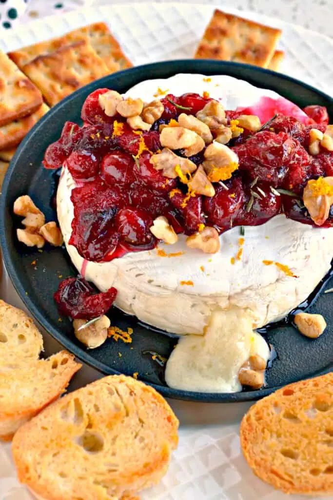 Never in the history of appetizers has there been a more elegant or easier recipe than this Baked Brie with Cranberries and Walnuts.