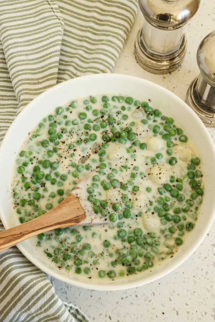 Season the creamed peas with plenty of salt and pepper, and fresh herbs or a little nutmeg. 