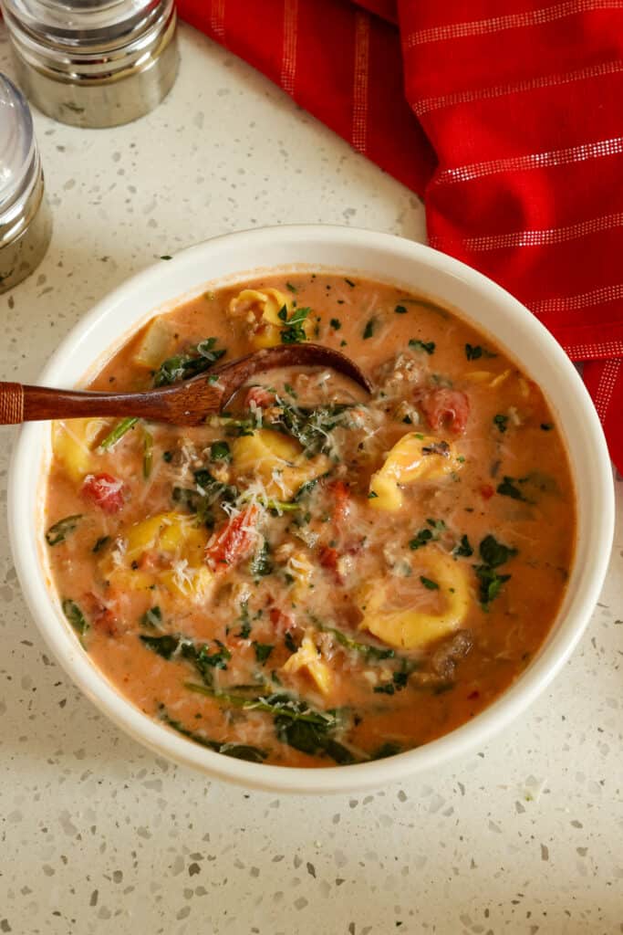 Garnish creamy tortellini soup with freshly grated Parmesan Cheese and chopped fresh parsley or basil.