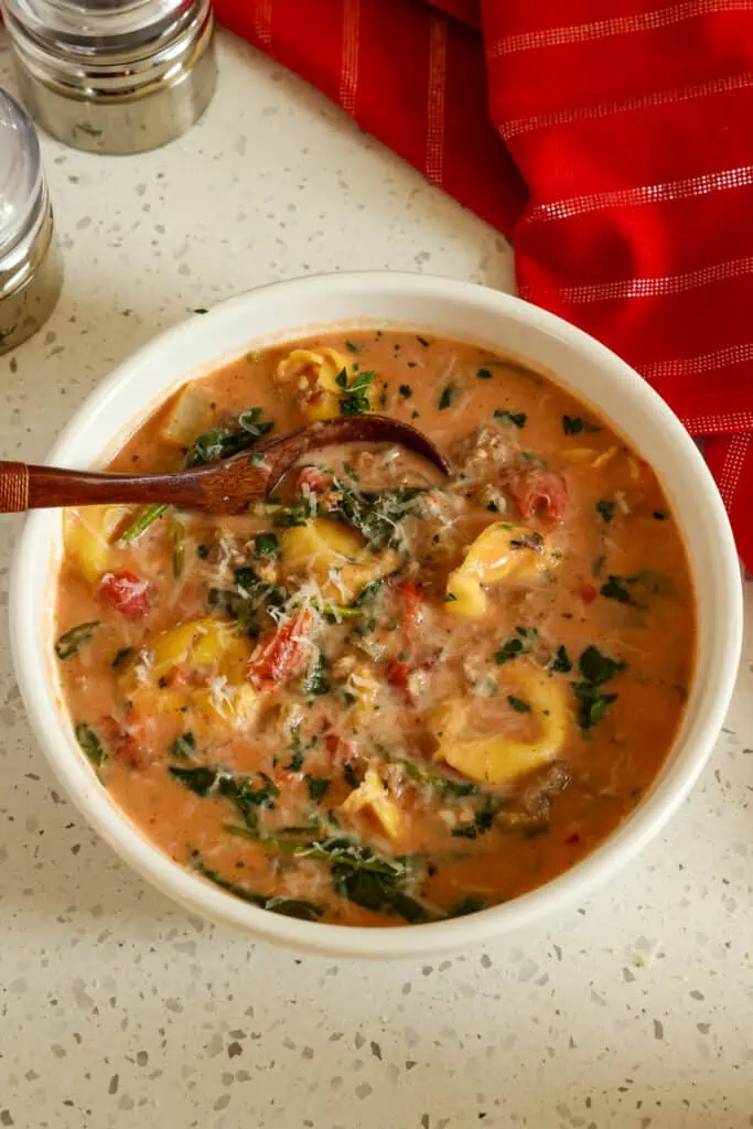 Garnish creamy tortellini soup with freshly grated Parmesan Cheese and chopped fresh parsley or basil. 