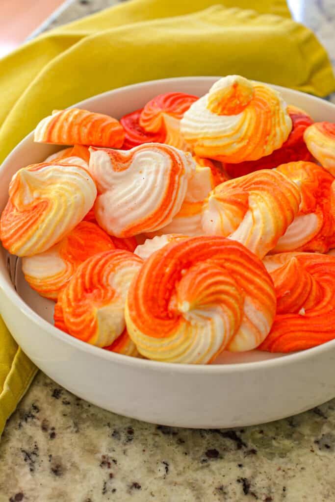 Meringue Cookie Recipe Meringue Cookies are easy to pipe and easy to color. You can adjust the colors for different holidays or cover them with festive sprinkles.