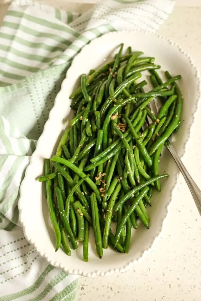 Sautéed Green Beans with garlic is a quick and easy side dish that complements almost any main course.