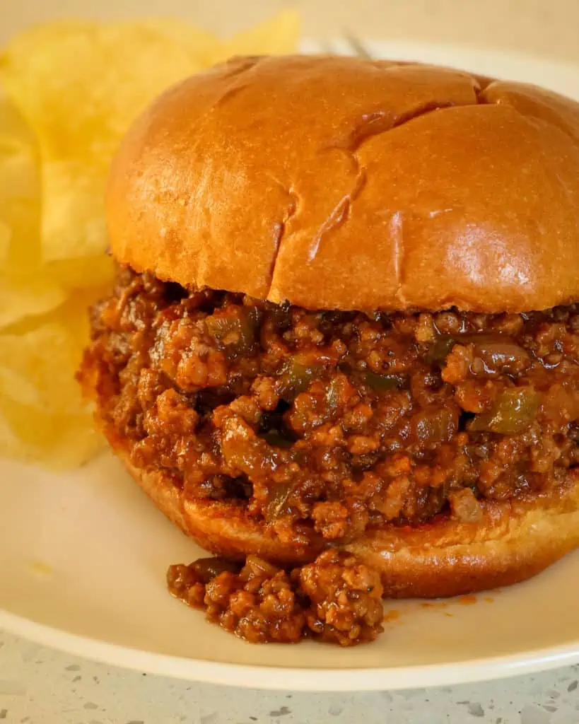 These sloppy joes are one of our favorite family recipes and is perfect for busy weeknights. It is full of flavor from onions, bell pepper, garlic, and brown sugar in a tomato-based sauce. 