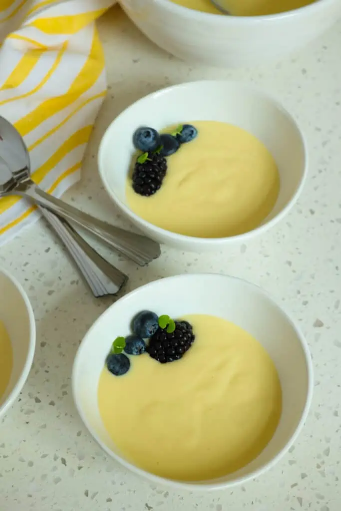 Pour the custard through a fine mesh strainer to remove any little bits of cooked egg that might have formed. This extra step is worth it for ensuring a smooth and velvety custard, and it only takes 1-2 minutes. 