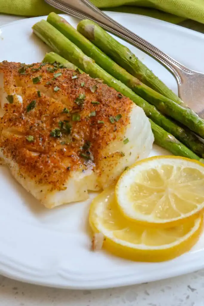 Delicious lemon Pepper Baked Cod with asparagus. 