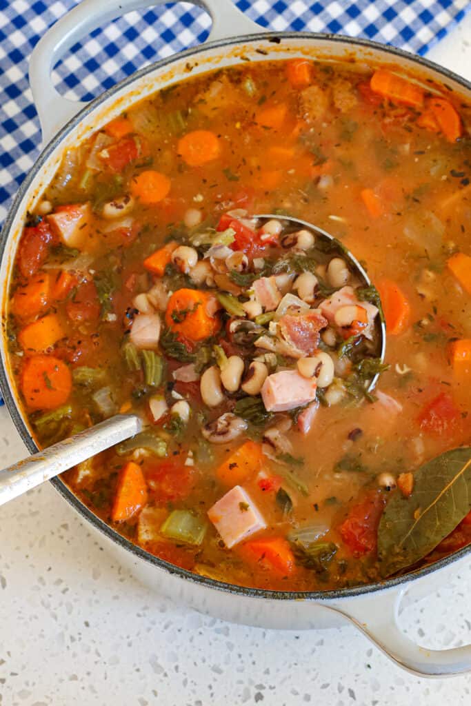 Add the ham, cooked bacon, and spinach, if using, and simmer for 2-3 minutes or until the spinach wilts.