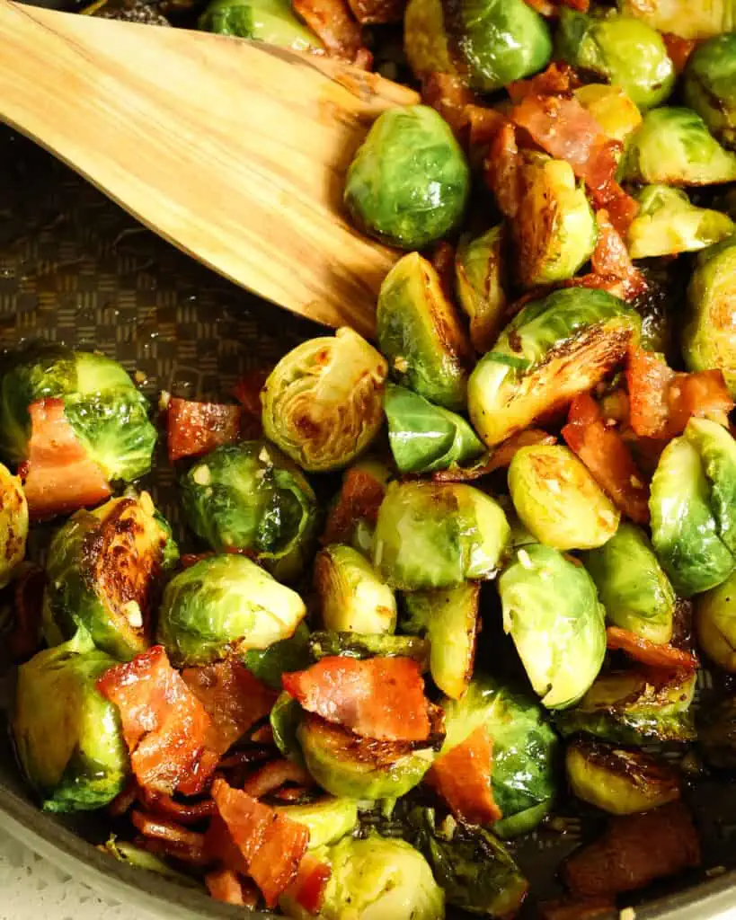 This Brussels sprouts recipe combines pan-sauteed Brussels sprouts with crispy bacon, garlic, and a drizzle of maple syrup. 