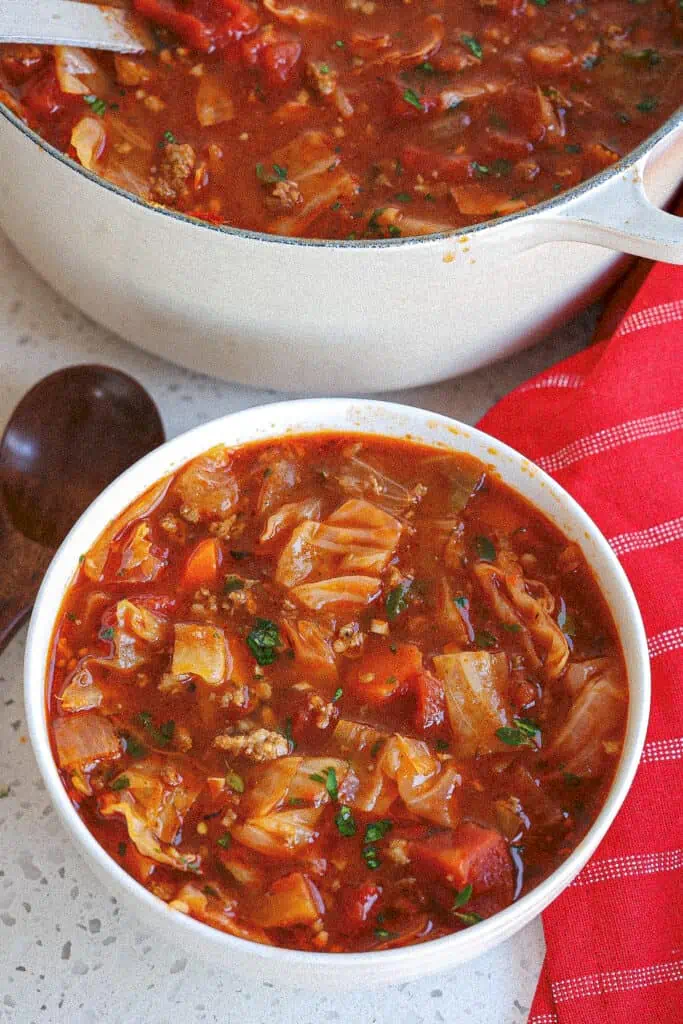 Cabbage soup is perfectly seasoned with marjoram, thyme, and paprika.  It comes together quickly and easily, so you can enjoy this healthy and hearty soup anytime. 