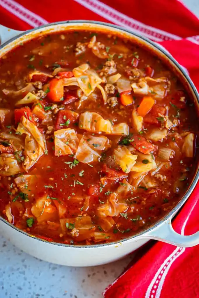 I really like the addition of fire-roasted tomatoes in cabbage soup, but canned diced tomatoes work well as a substitute. 