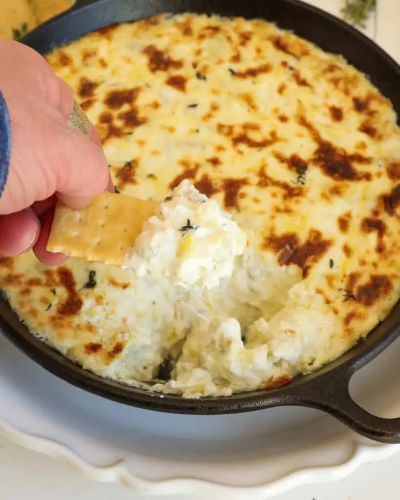 Learn how to make this quick and tasty artichoke dip in just a few simple steps. It is always a huge win for gameday and movie nights.