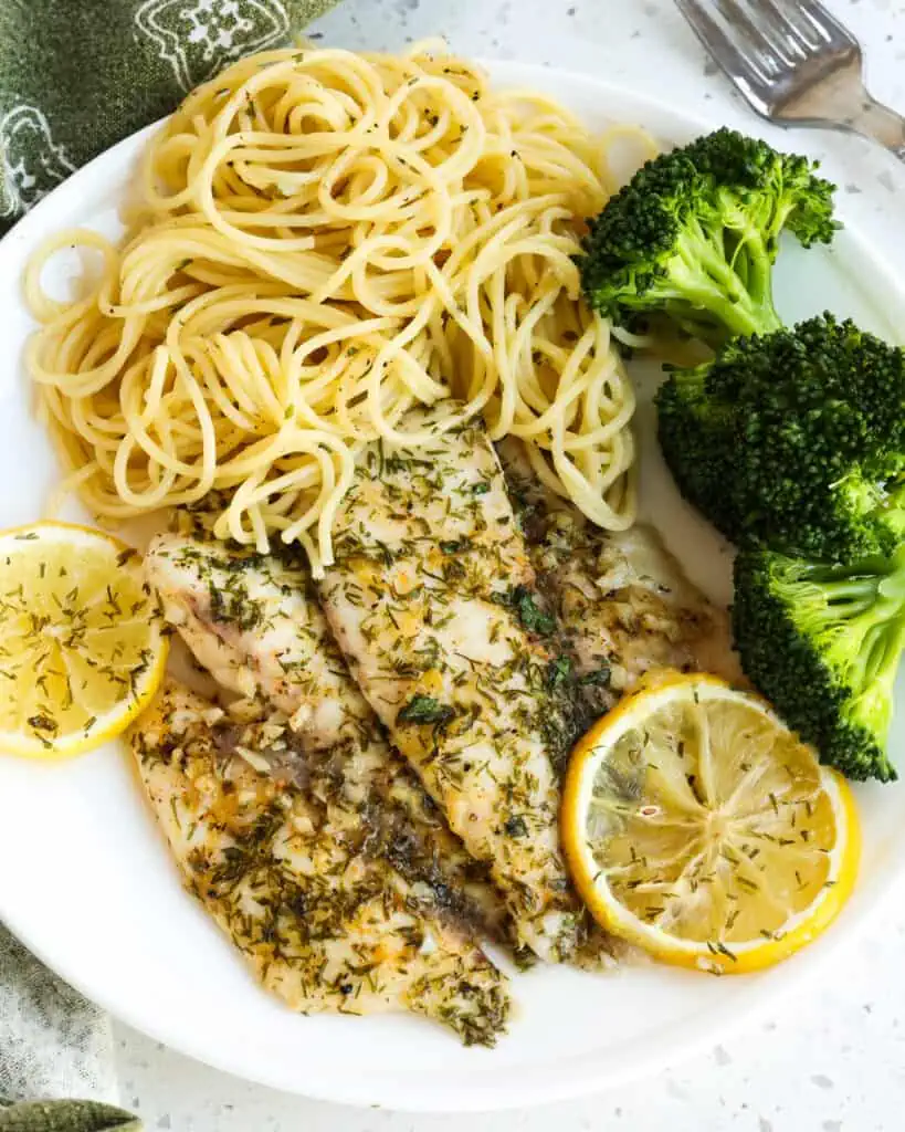 Enjoy this Lemon Dill Baked Tilapia made with fresh lemon, dill, and parsley.  It bakes up perfectly every time and is on the table in less than 15 minutes. 