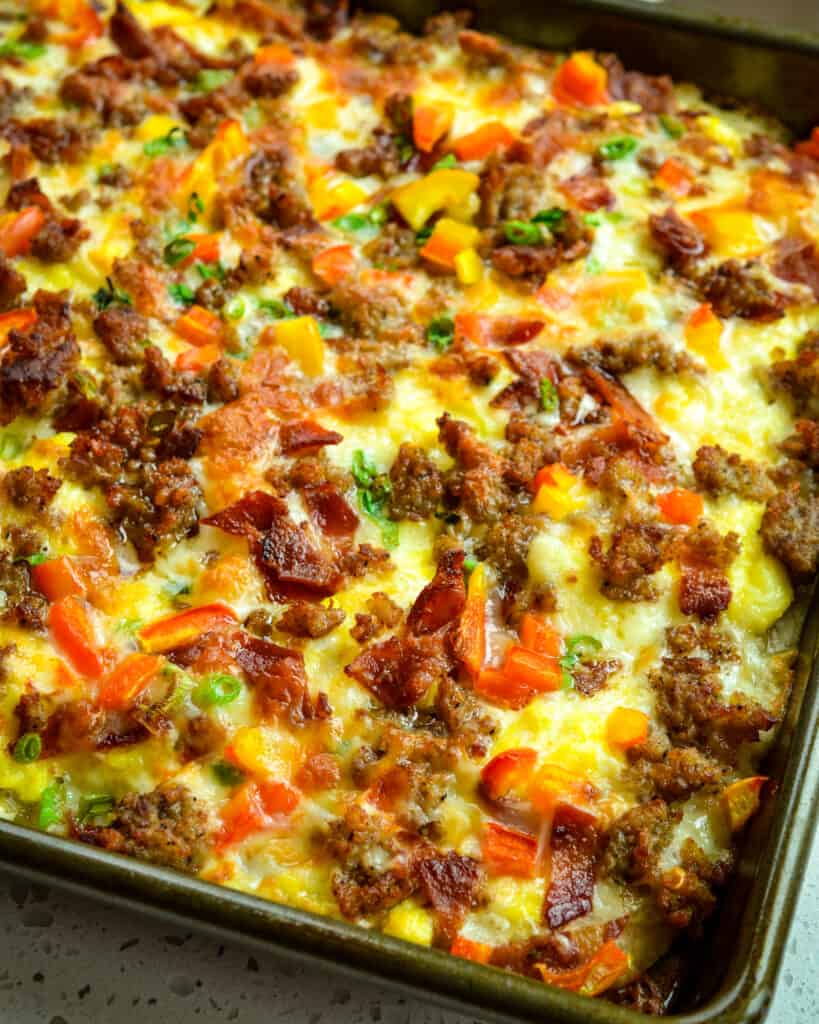 Satisfy your morning cravings with this delicious breakfast pizza loaded with savory sausage, bacon, scrambled eggs, and melted cheese. Check out our recipe video to see all the steps and make it at home! 