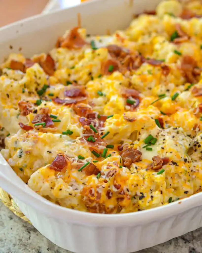 This Loaded Cauliflower Casserole can be served as a full meal. It really is very filling, but if more protein is desired, consider adding roasted or grilled chicken or cooked ground beef. 