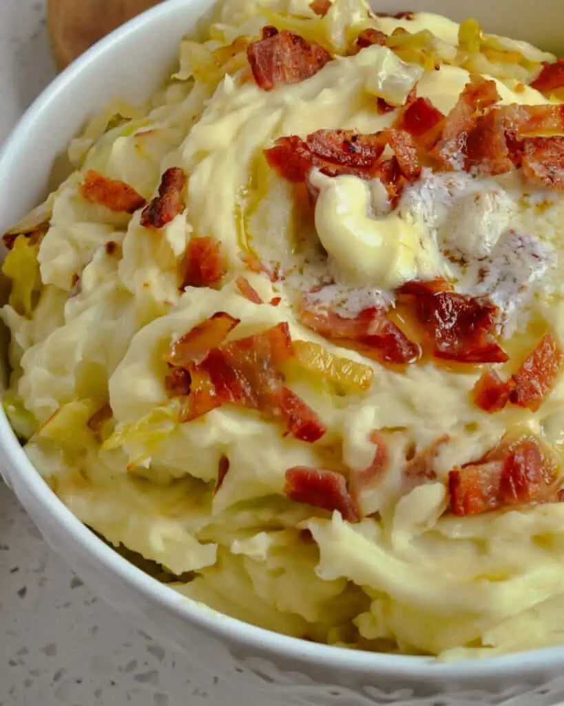 Traditional Irish Colcannon is a delectable combination of creamy mashed potatoes and pan-fried cabbage lightly seasoned with salt and black pepper. 