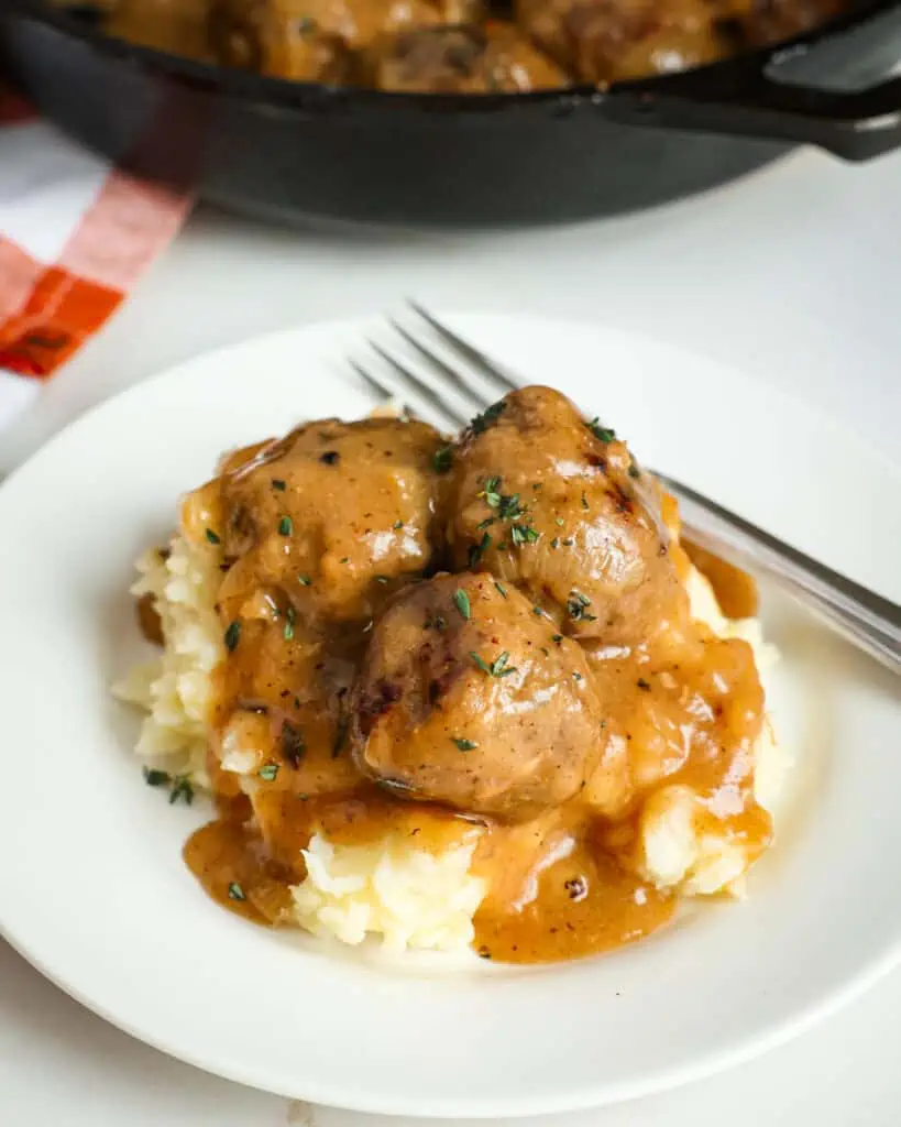 Find comfort in this classic dish of tender meatballs smothered in onions and savory gravy.