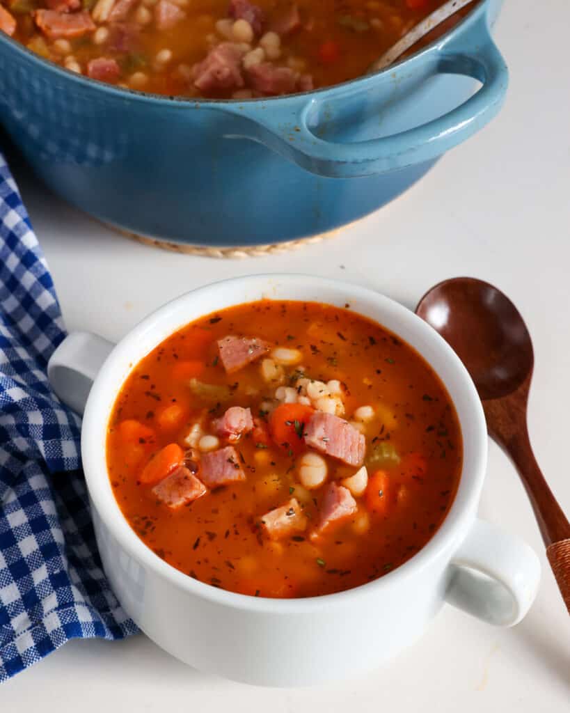 If you prefer this soup a little creamier, use an immersion blender or stand blender to puree a couple of cups of the soup after removing the ham bone but before adding the cut-up pieces of ham.
