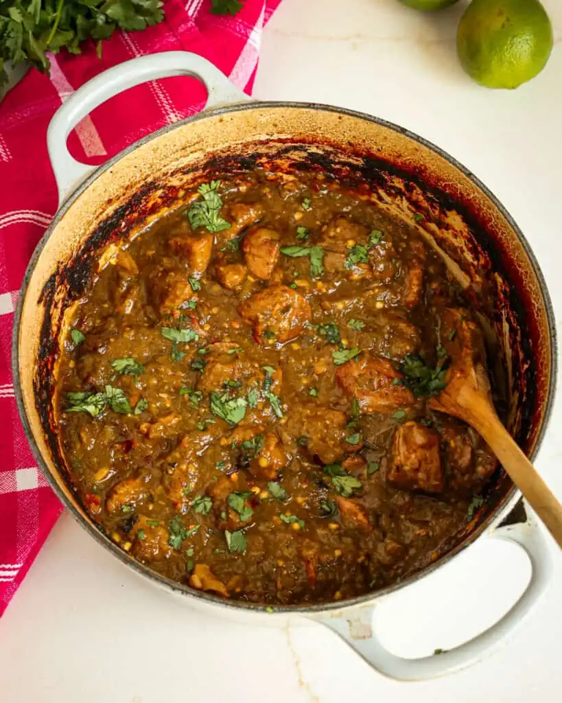 Cover the pot and place it in the oven at 325 degrees for about 2 1/2 hours or until fork tender. Remove from the oven, stir in the lemon juice, and sprinkle with chopped fresh cilantro. 