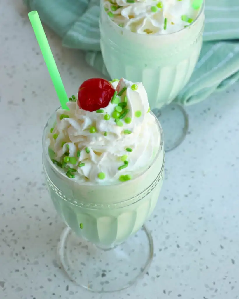 Bring the sweet taste of vanilla and mint home with this sweet, creamy copycat recipe of McDonald's Shamrock Shake. 