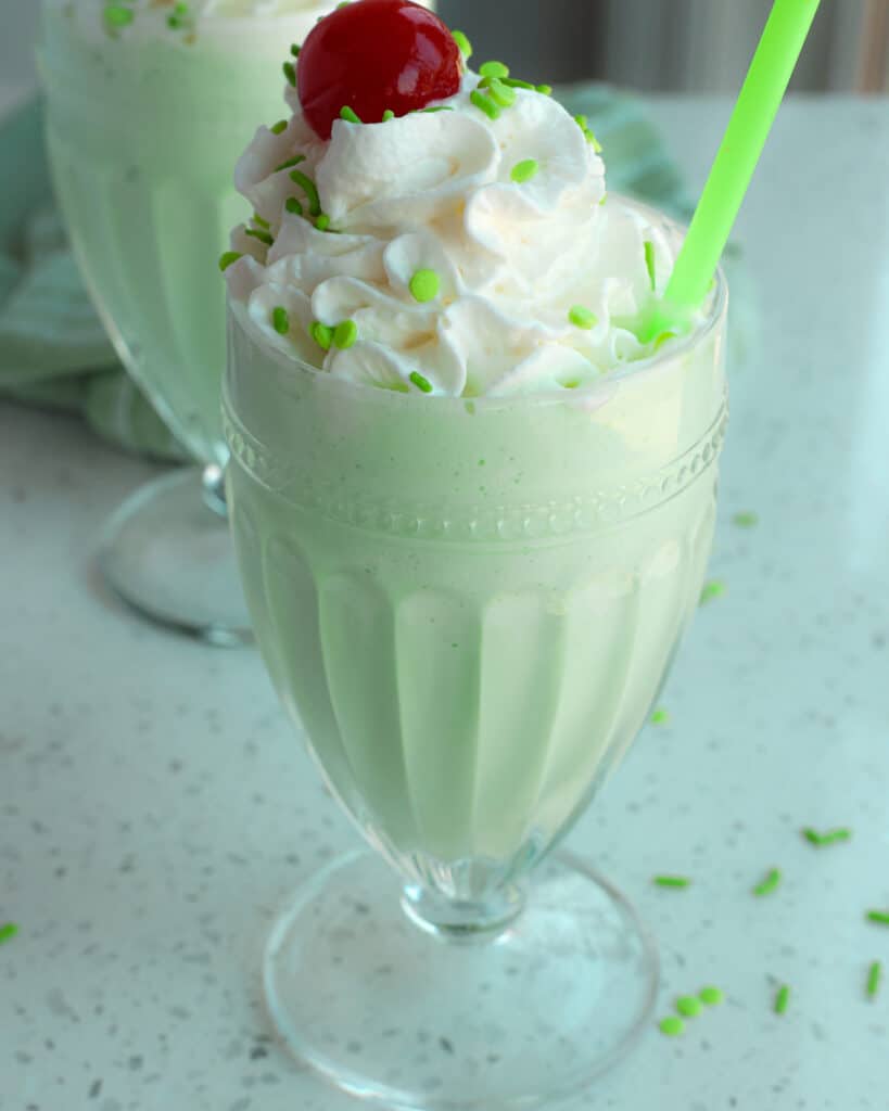 Learn how to make a delicious homemade shamrock shake with real mint. It's the perfect treat for St. Patrick's Day or any time of the year!