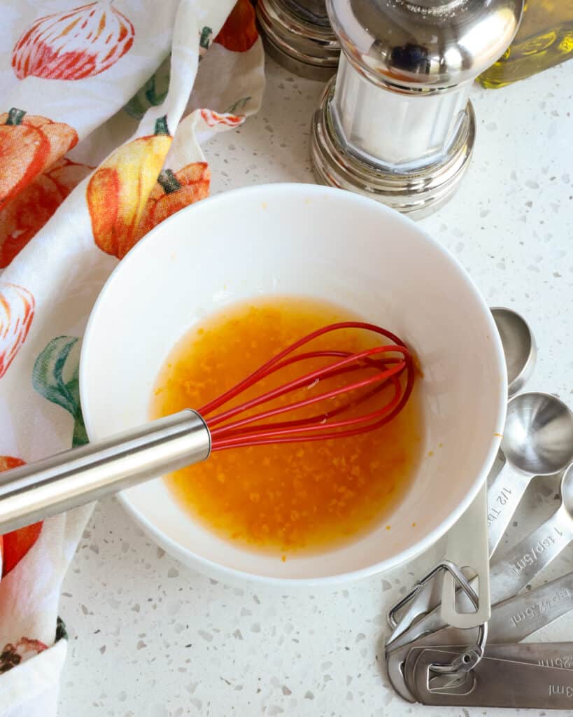 The orange juice and orange zest in this vinaigrette are so refreshing with just the right pop for so many salads.