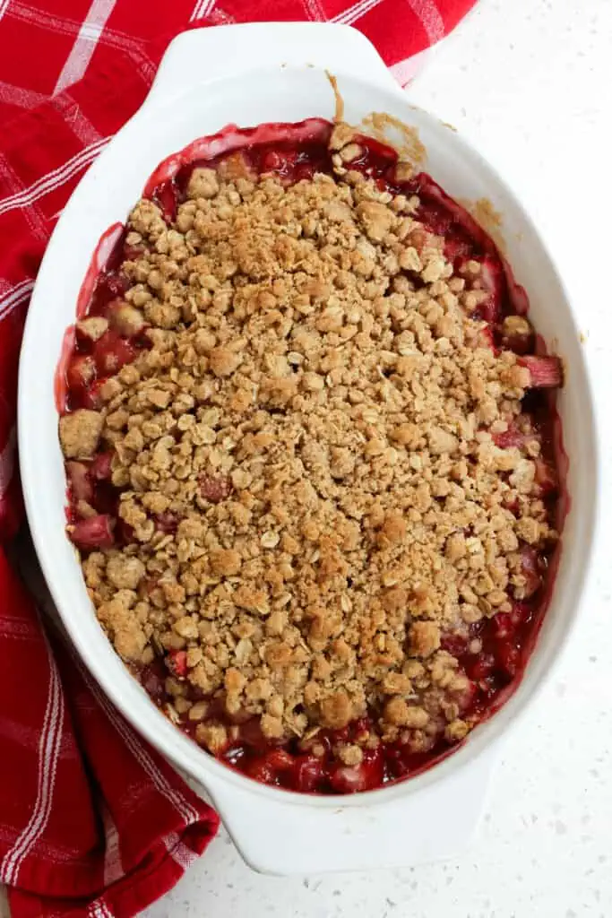This Strawberry Rhubarb Crisp is so delicious your friends and family will rave about this dessert. Somehow, this tart, sour vegetable, and this sweet, scrumptious berry pair to make a winning combination. 
