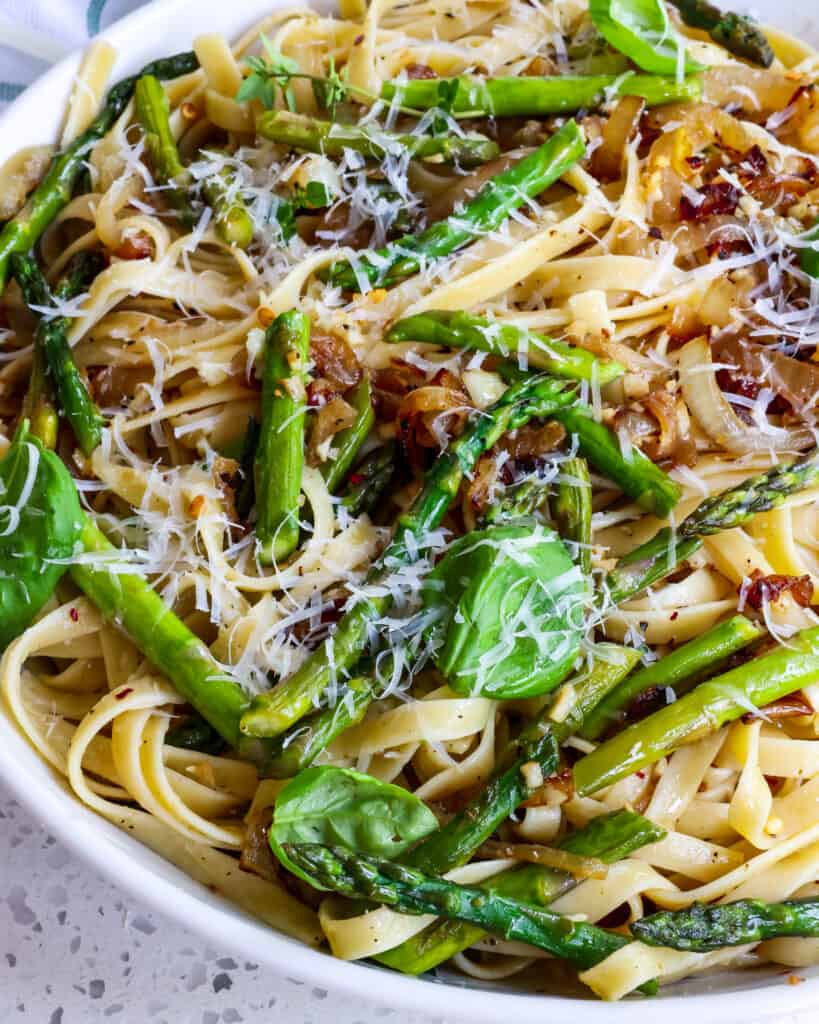Fresh herbs and grated fresh Parmesan cheese take this simple pasta over the top.  
