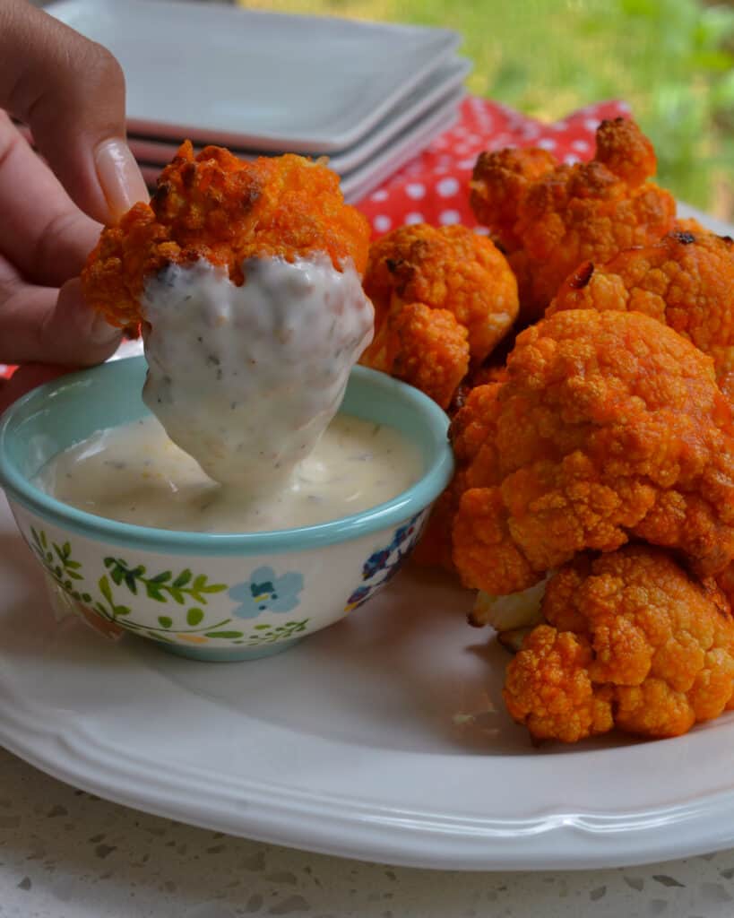 This unique Buffalo Cauliflower bites recipe has a little bit of a twist from the standard buffalo chicken recipe as it is made with cauliflower florets. 