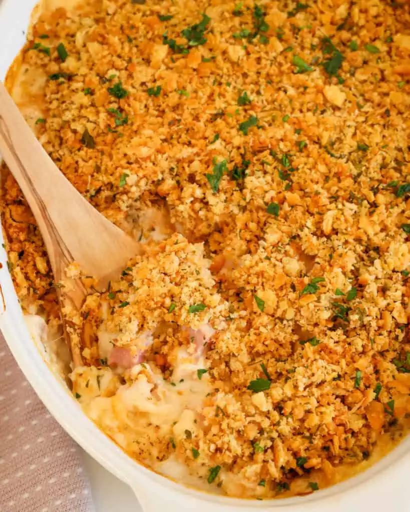 This easy casserole is sure to become one of your family favorites. It combines tender chicken, sweet ham, Swiss cheese, and a perfect blend of spices, all in a luscious cream sauce topped with a buttery cracker topping.