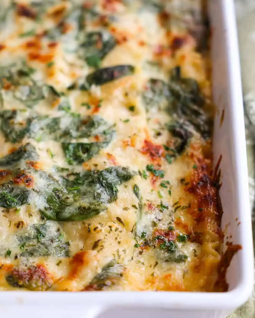 Cover the casserole dish with aluminum foil and bake for 30 minutes. Remove the foil and bake uncovered for another 15-20 minutes or until lightly browned. If desired, sprinkle with chopped fresh parsley. 