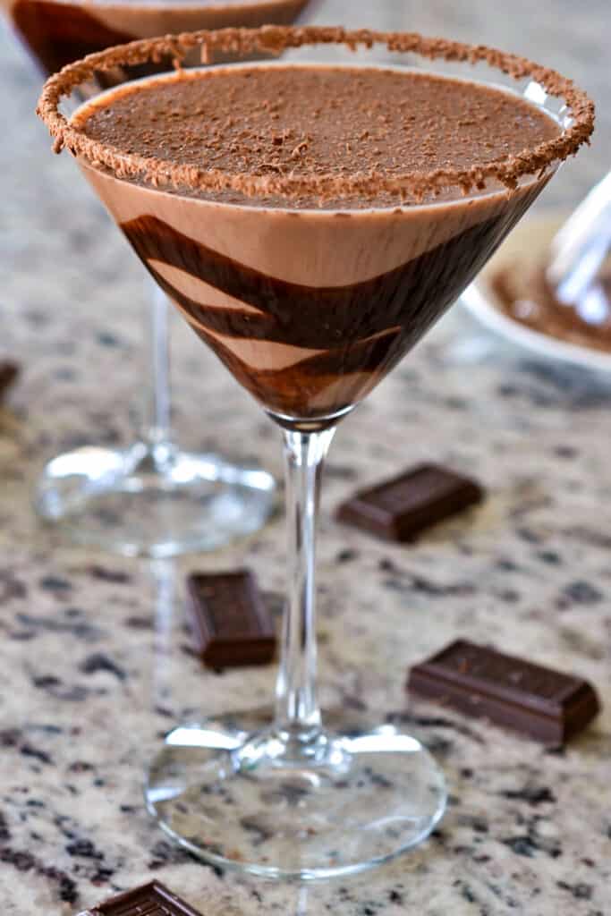 Indulge in this decadent chocolate martini, made with rich chocolate liqueur, creamy creme de cacao, and smooth vodka