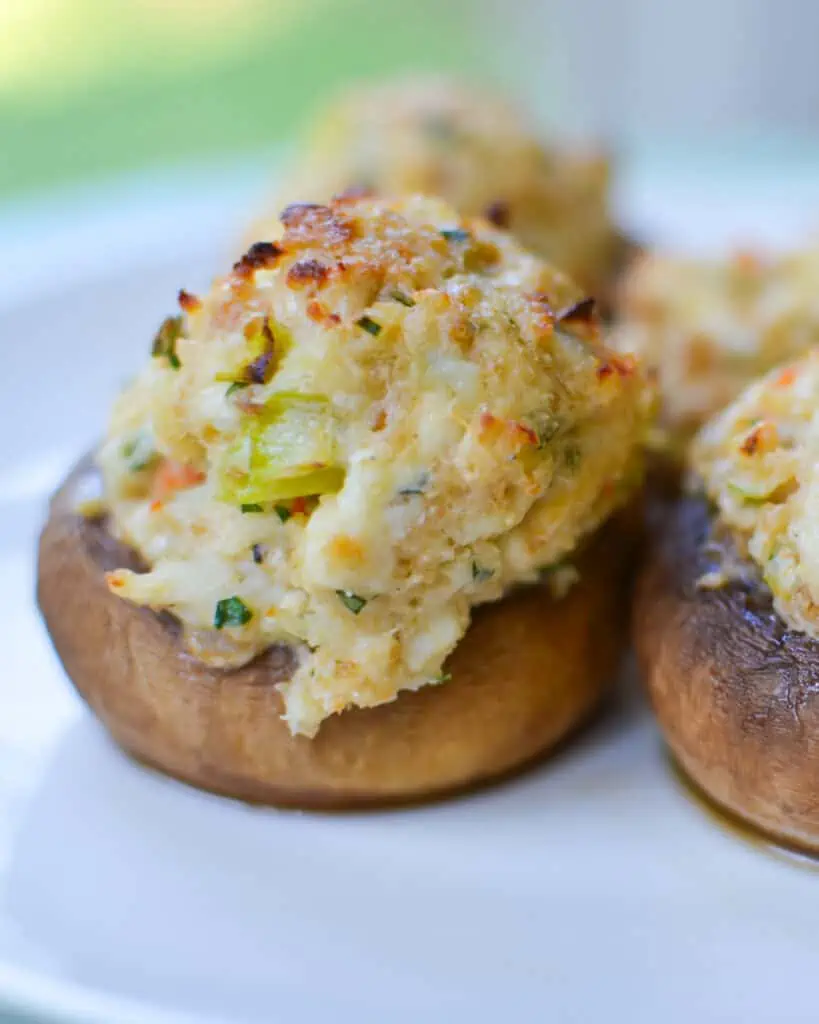 These delicious and easy Crab Stuffed Mushrooms are the perfect party appetizer or light supper. Use white button, cremini, or portobellos for a main course. 