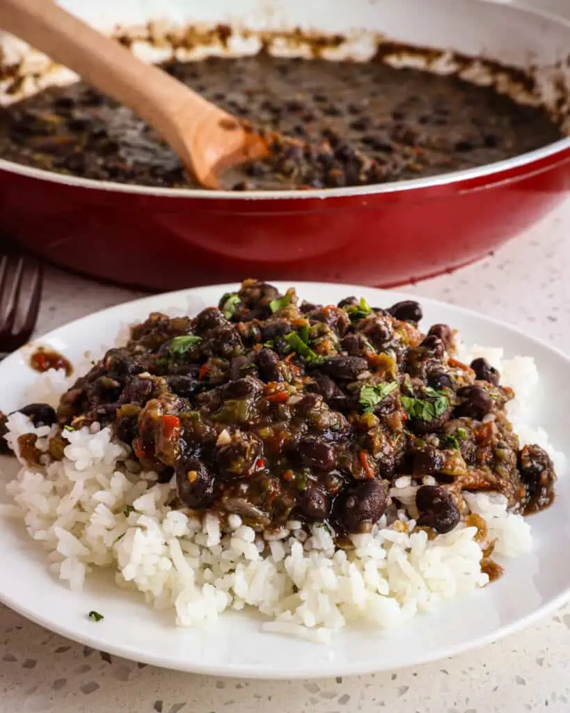 Learn the secrets to making traditional Cuban black beans and rice, just like how they do it in Cuba