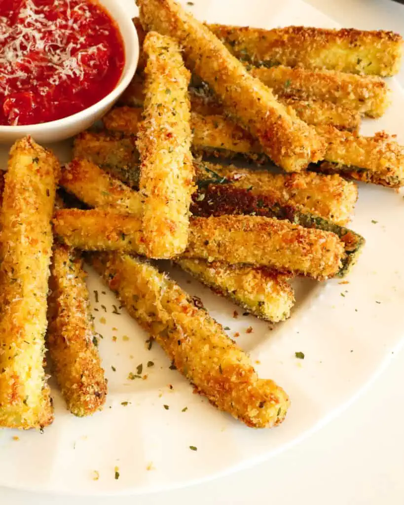 Transform ordinary zucchini into a crispy and flavorful dish with this easy-fried zucchini recipe. 