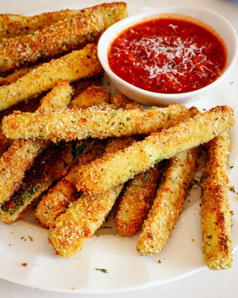 Serve Fried Zucchini as an appetizer or a tasty side dish with a bowl of warm marinara or homemade avocado ranch dressing. 