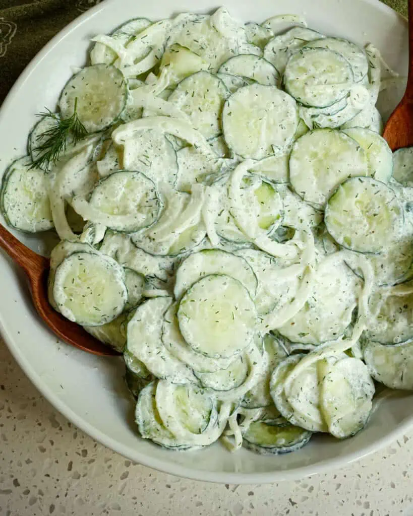 This delectable sour cream-based German Cucumber Salad, also known as gurkensalat, is made with a little more than a handful of ingredients in less than fifteen minutes. 