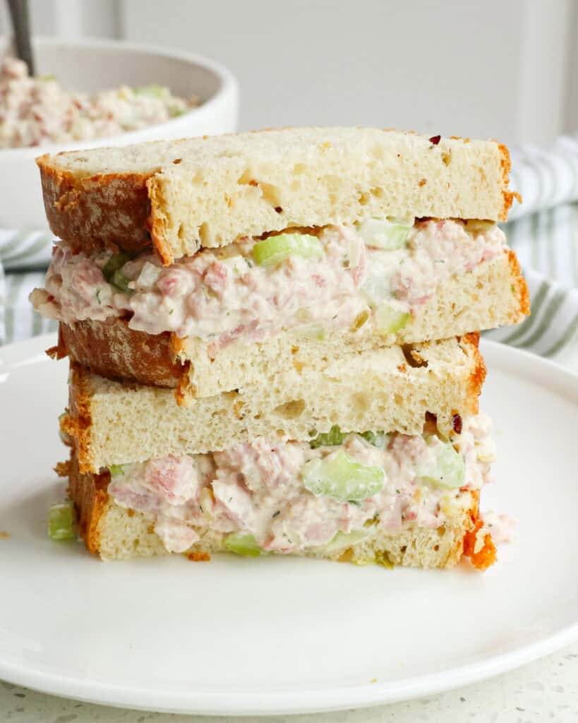 A ham salad cut in half and double stacked. 