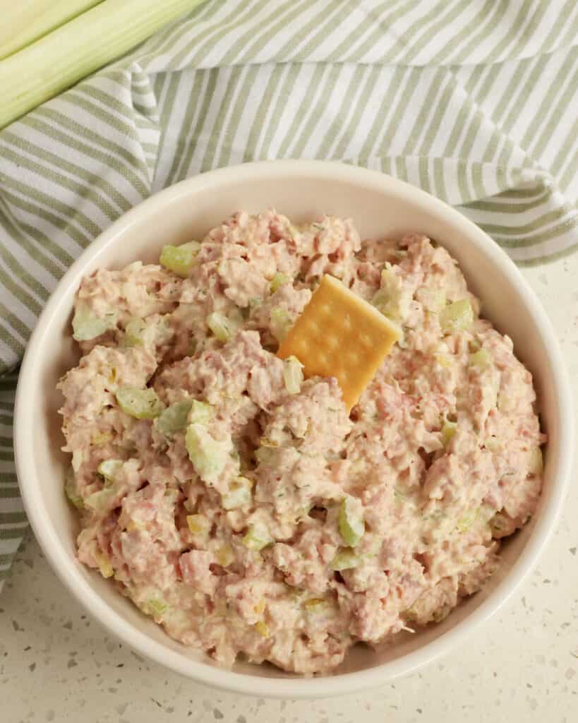 Ham Salad is so incredibly easy to make and can be enjoyed on fresh rolls, Hawaiian bread, pumpernickel, rye, crackers, or even celery sticks for a low carbohydrate diet. 