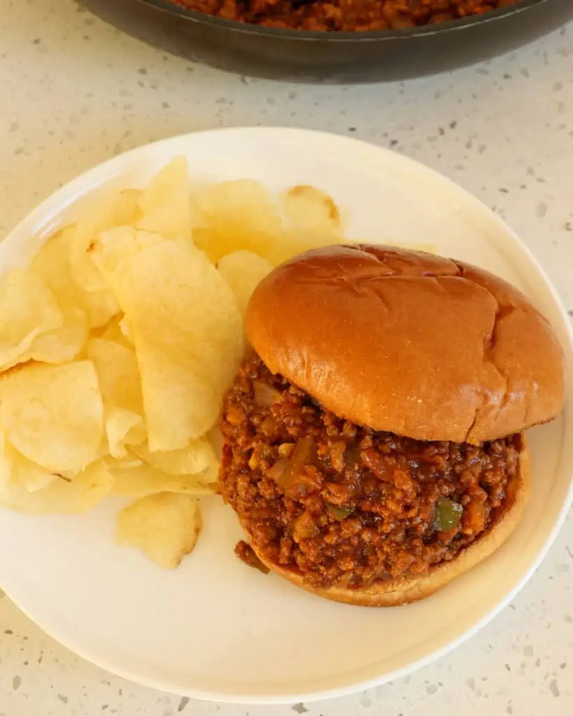 Delectable family-friendly, easy weeknight Homemade Sloppy Joes made with many common pantry ingredients.  This recipe requires limited hands-on time and is ready in under 30 minutes.