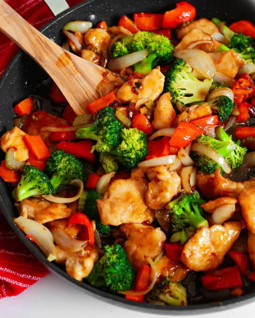 This spicy Hunan chicken recipe is packed with bold flavors, tender chicken, and fresh vegetables that can easily rival any takeout version.