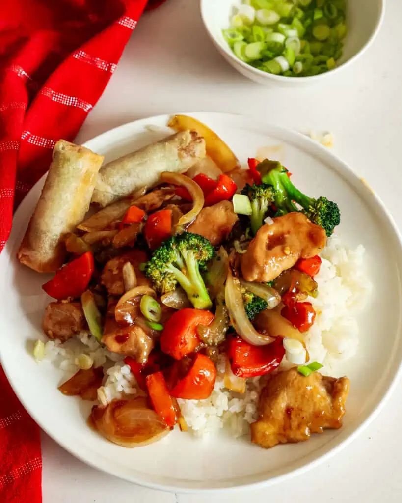 With fresh vegetables like onion, celery, broccoli, red bell pepper, and carrots, this Hunan chicken dish is both hearty and healthy.