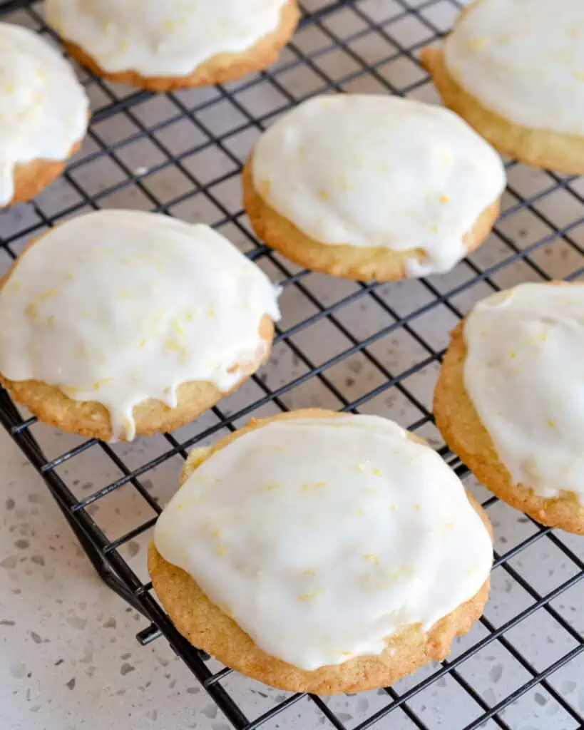 These delectable soft lemon cookies are perfect for spring with a super easy four ingredient tangy lemon icing.