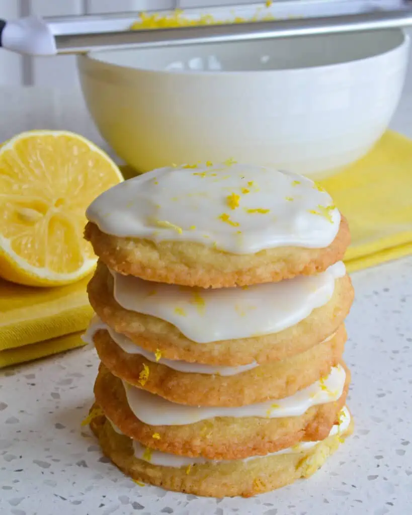Iced Lemon Cookies are soft on the inside with slightly crispy edges all topped with a four ingredient sweet lemon glaze.