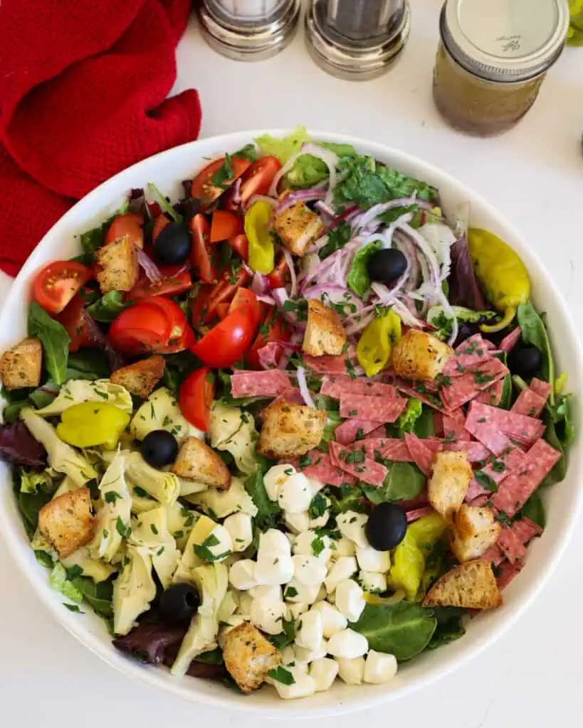 This delicious Italian Salad with homemade salad dressing is an excellent way to incorporate more vegetables into your diet.