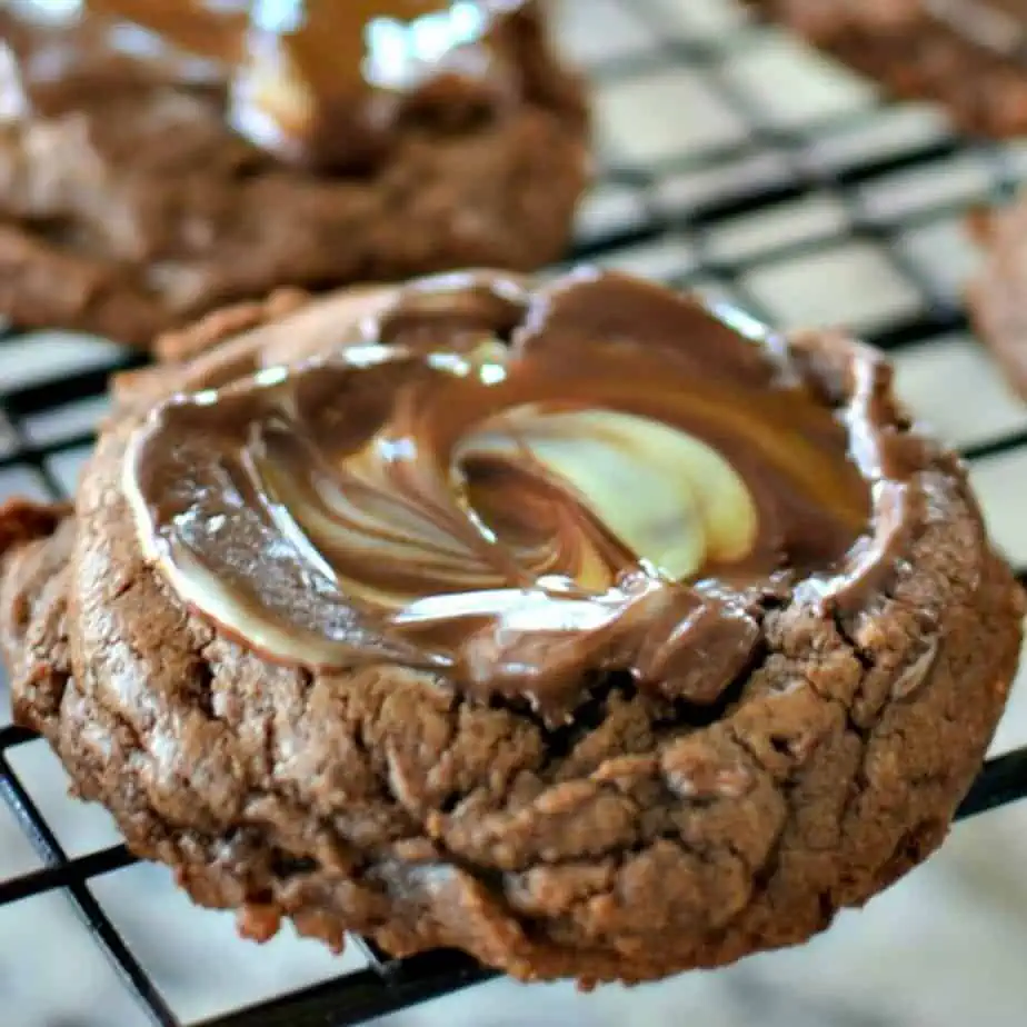 An easy soft and chewy chocolate cookie topped with an Andes mint that is melted and swirled on the top.  This is a family and friend favorite cookie and they just can not get enough of them.